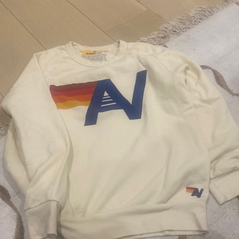 AV cream colored hoodie